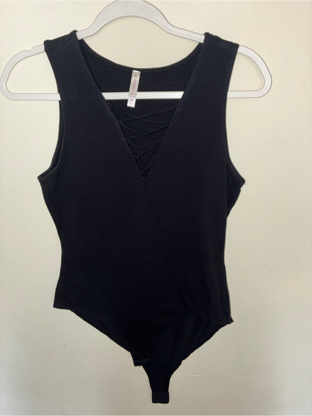Xhilaration black sleeveless bodysuit -Medium